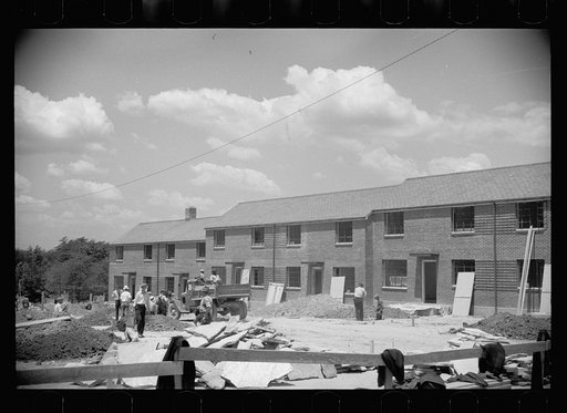 Brick-veneer house nearing completion, Greenbelt, Maryland
