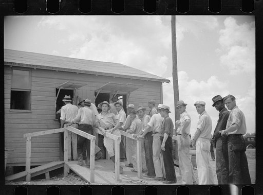 Workmen receiving paychecks, Greenbelt, Maryland