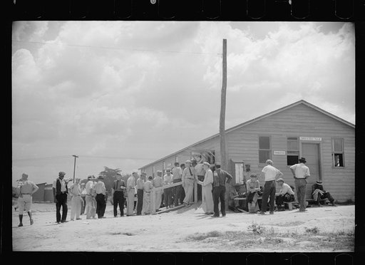 Workmen receiving paychecks, Greenbelt, Maryland