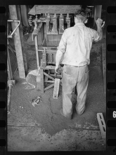 Untitled photo, possibly related to: Making cinder block for use on the Greenbelt Project, Maryland