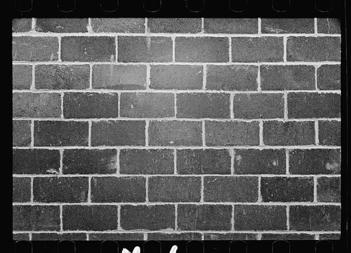 Greenbelt, Maryland. A model community planned by the Suburban Resettlement Division of the U.S. Resettlement Administration. Cinder block wall on the project