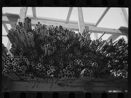 Untitled photo, possibly related to: Pipe storage at Greenbelt, Maryland