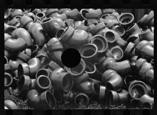 Untitled photo, possibly related to: Sewer pipe storage, Greenbelt, Maryland