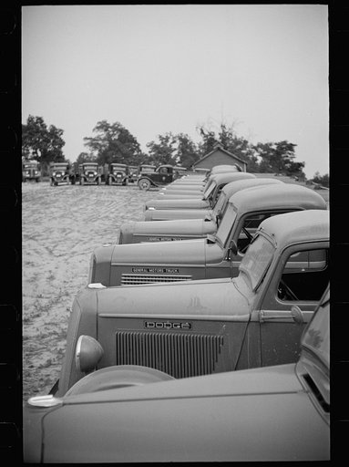 Untitled photo, possibly related to: Resettlement trucks, Greenbelt, Maryland