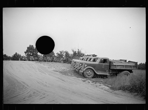 Untitled photo, possibly related to: Resettlement trucks, Greenbelt, Maryland