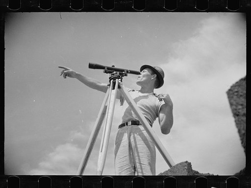 Untitled photo, possibly related to: Surveyor working in a model community planned by the Suburban Division of the United States Resettlement Administration, Greenbelt, Maryland
