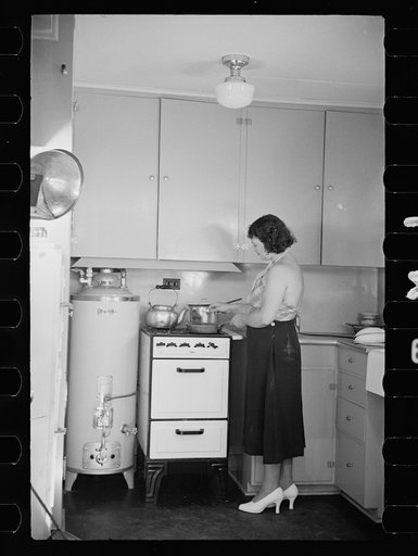 Untitled photo, possibly related to: Hightstown homesteader in the kitchen of her new home, New Jersey