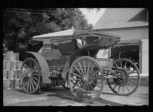 Old horseless carriage at gasoline station near Lost River, New Hampshire