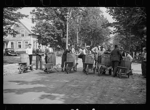 Start of the two-man wheelbarrow and barrel race. Fair at Albany, Vermont