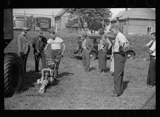 Practical exhibition of farm equipment always finds the interested, Springfield, Massachusetts