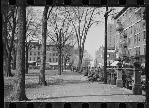 Untitled photo, possibly related to: Man in the park, Manchester, New Hampshire