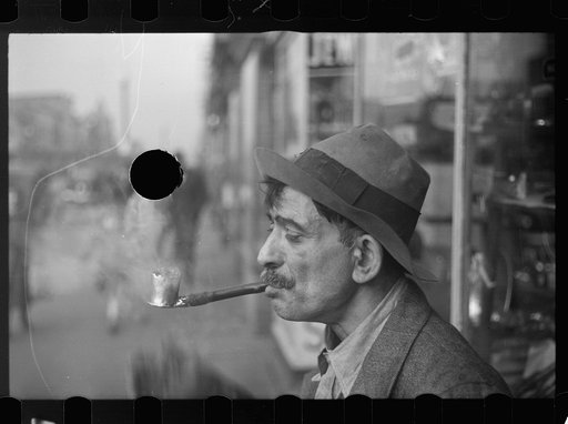 Untitled photo, possibly related to: Man with homemade pipe, Washington, D.C.