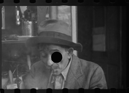 Untitled photo, possibly related to: Man with homemade pipe, Washington, D.C.