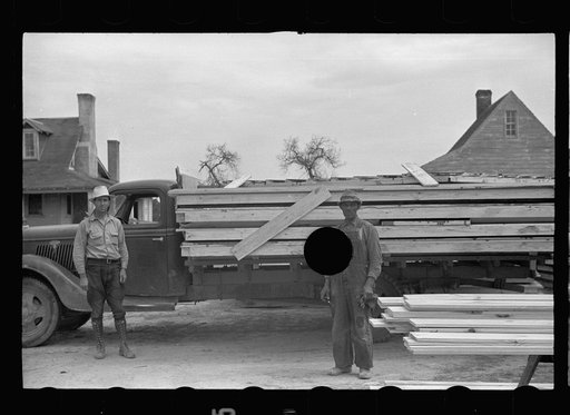 Untitled photo, possibly related to: Truck loaded with parts of prefabricated house, Roanoke Farms, North Carolina