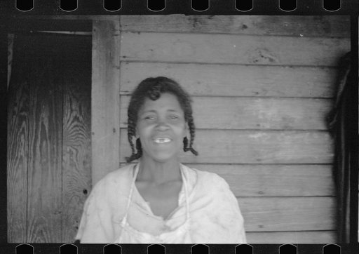 Untitled photo, possibly related to: Sharecropper and sharecropper's dog. North Carolina