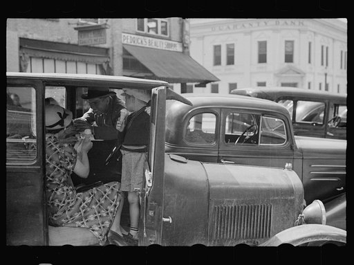 Farm family in town, Washington, North Carolina