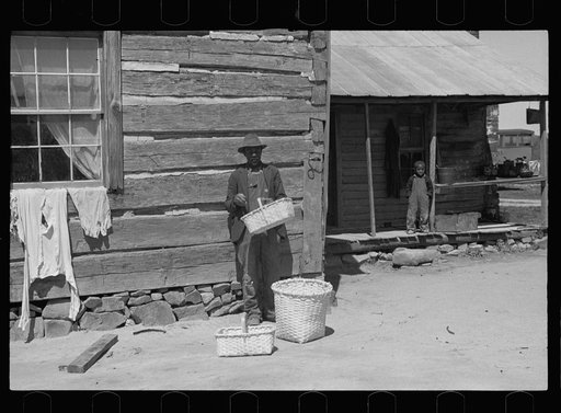 Nat Williamson with some of  the baskets he makes, Guilford County, North Carolina