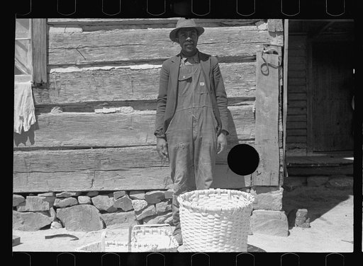 Untitled photo, possibly related to: Nat Williamson with some of  the baskets he makes, Guilford County, North Carolina