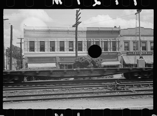 Untitled photo, possibly related to: Main street and railroad tracks, Rocky Mount, North Carolina