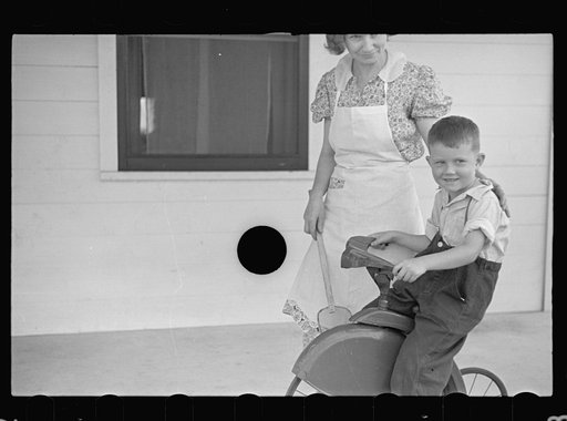 Untitled photo, possibly related to: Home supervisor showing Mrs. Pope how to keep account book, Irwinville Farms, Georgia