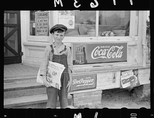 Farm boy who sells "Grit." Irwinville Farms, Georgia