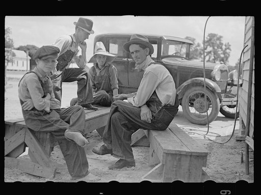 Untitled photo, possibly related to: Rolling a cigarette. Irwinville Farms, Georgia