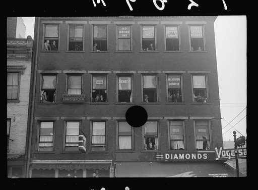 Untitled photo, possibly related to: Spectators at Cincinnati sesquicentennial parade, Cincinnati, Ohio