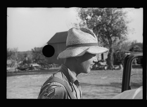 Untitled photo, possibly related to: Rehabilitation client rolling a cigarette. Gage County, Nebraska