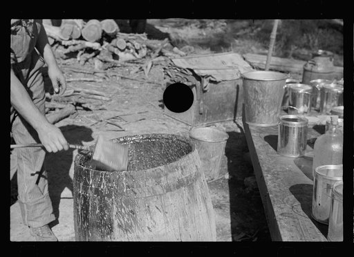 Untitled photo, possibly related to: Farmer working at sorghum mill, Lancaster County, Nebraska