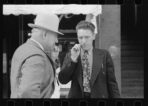 Men picking their teeth, Beatrice, Nebraska