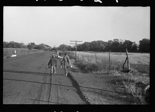 Farm children walking to one-room schoolhouse with lunch pails, Nebraska