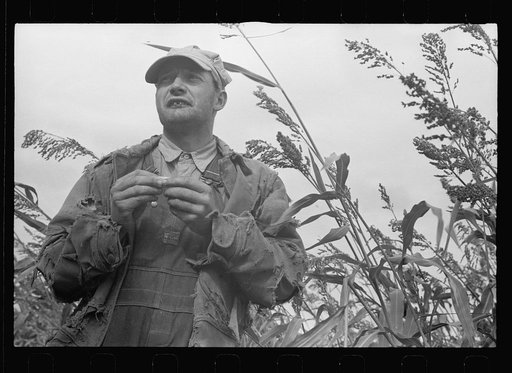 Coffey County, Kansas. Rolling a cigarette