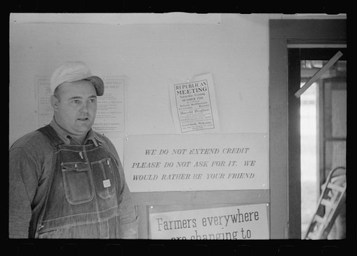 Manager of Farmer's Union Coop elevator in his office. This cooperative received a loan from the FSA (Farm Security Administration). Centralia, Kansas