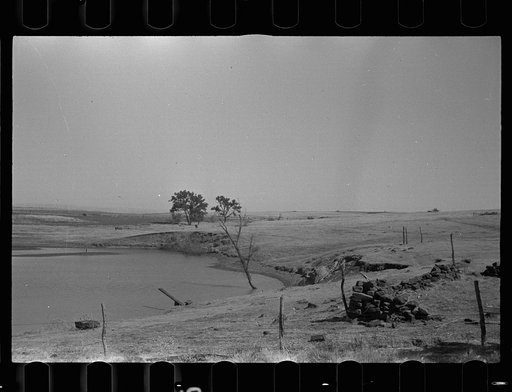 Stockwater dam on farm of rehabilitation client. Ottawa County, Kansas
