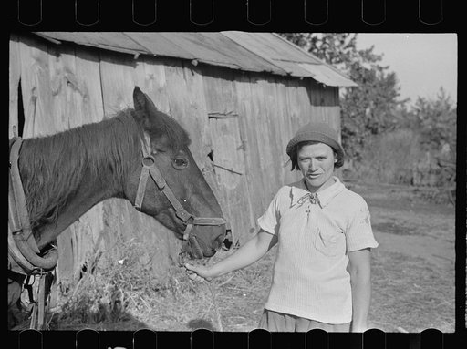 Girl who operates large farm with help of her sister and a rehabilitation loan, Coffey County, Kansas