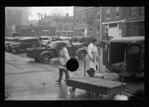 Untitled photo, possibly related to: Unloading meat in wholesale district, Omaha, Nebraska