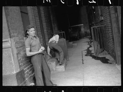Boys playing in alley, South Omaha, Nebraska