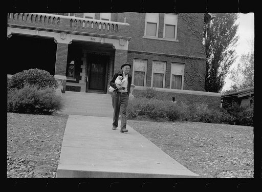 Leaving house from which he failed to get something to eat, Omaha, Nebraska