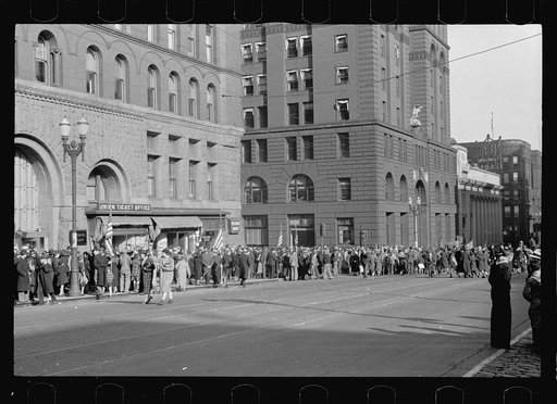 People waiting for parade to pass, Omaha, Nebraska
