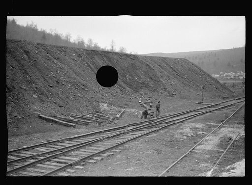 Untitled photo, possibly related to: Miner's sons bringing home salvaged coal during May 1939 coal strike.  Kempton, West Virginia