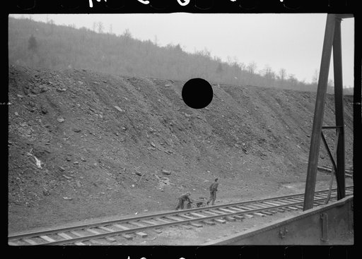 Untitled photo, possibly related to: Miner's sons bringing home salvaged coal during May 1939 coal strike.  Kempton, West Virginia