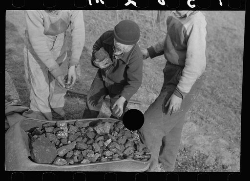 Untitled photo, possibly related to: Miner's sons bringing home coal which they have salvaged from slag pile.  Kempton, West Virginia