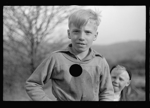 Untitled photo, possibly related to: Miner's sons salvaging coal from slag pile during May 1939 coal strike.  Kempton, West Virginia