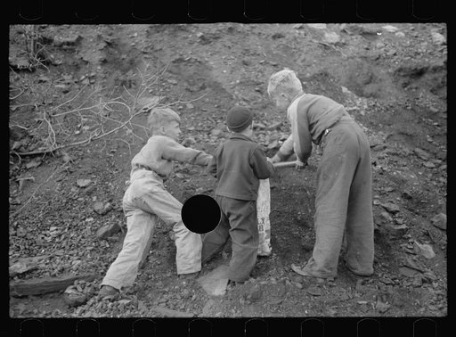 Untitled photo, possibly related to: Miner's sons salvaging coal during May 1939 strike, Kempton, West Virginia