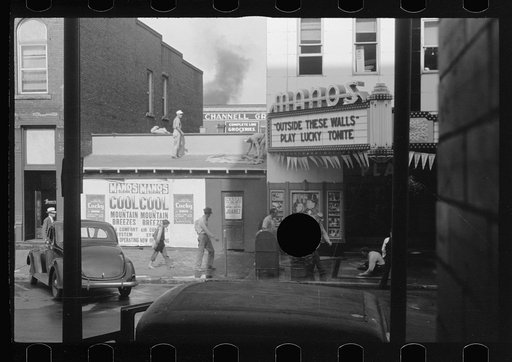 Untitled photo, possibly related to: Movie theatre, Elkins, West Virginia. There are two movies in town, both offer games of chance three nights a week to drum up trade on slack nights