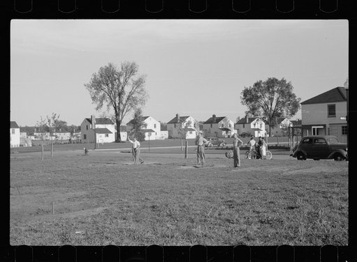 Untitled photo, possibly related to: Pitching horseshoes, Greendale, Wisconsin