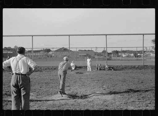 Untitled photo, possibly related to: Pitching horseshoes, Greendale, Wisconsin