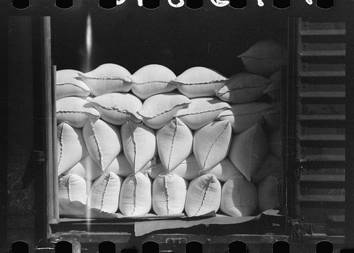 Untitled photo, possibly related to: Freight car loaded with sacks of flour, Pillsbury mills, Minneapolis, Minnesota