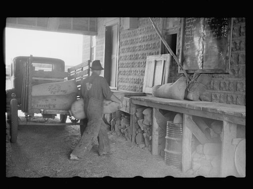 Untitled photo, possibly related to: Sign at grain elevator, Rice, Minnesota
