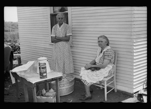 Ladies serving lunch at auction near Tenstrike, Minnesota